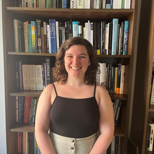 Angela King against a bookcase